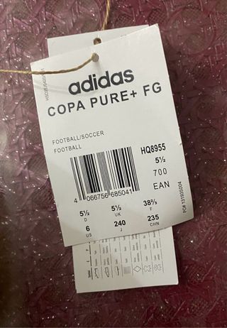 Scarpe da calcio Adidas per bambini bianche e verdi