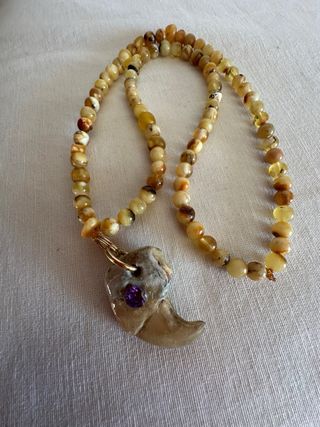 Garra de león con amatista y ámbar