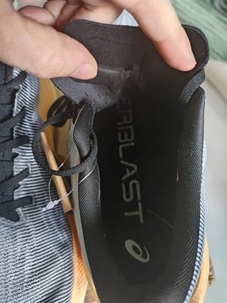 Zapatillas ASICS running grises y naranjas