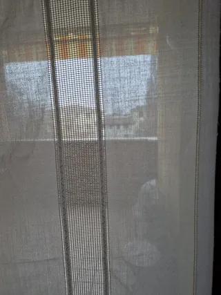 Tenda bianca per portafinestra