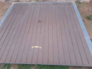 Puerta de garaje de metal imitacion madera