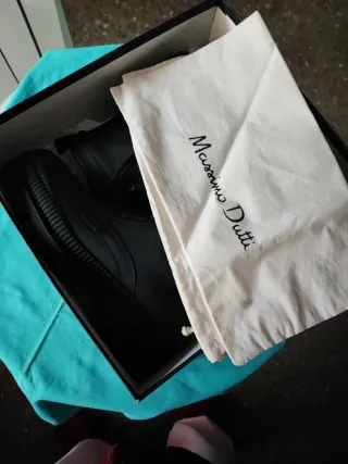 Botas negras de cordones de piel y para el agua