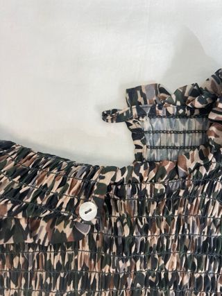 Blusa estampada geométrica manga larga