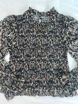 Blusa estampada geométrica manga larga