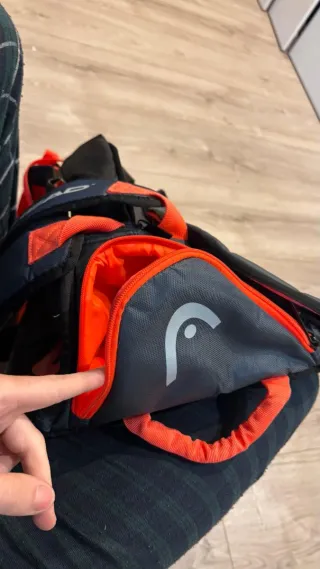 Paletero Head Tour Negro y Naranja.