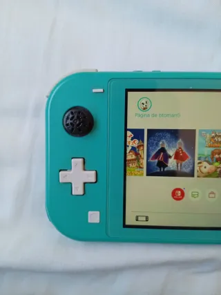 Nintendo Switch Lite + Mario Rabbids + Caricatore