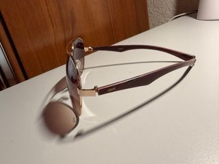 Gafas de sol aviador doradas y marrones