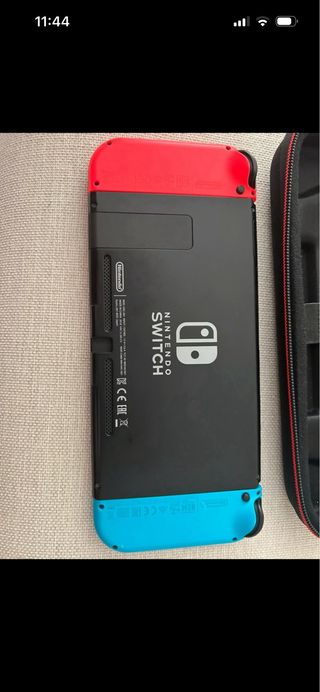 Nintendo Switch+  Funda Negra + juegos