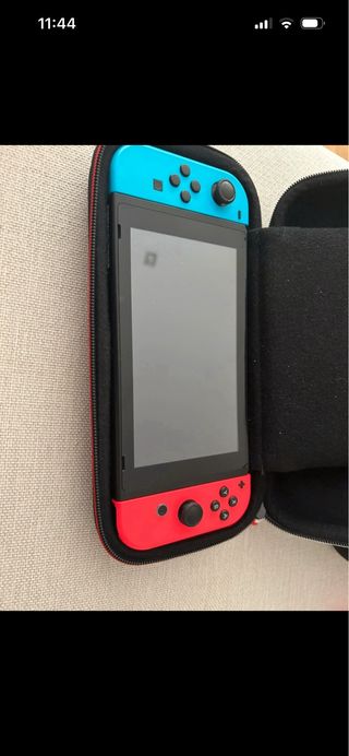 Nintendo Switch+  Funda Negra + juegos