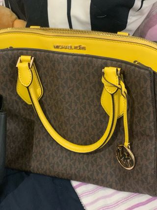 Bolsos Louis Vuitton y Michael Kors