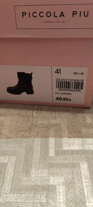 Botines negros nuevos.