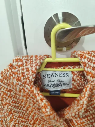 Abrigo Newness Talla 12 meses (80 cm)