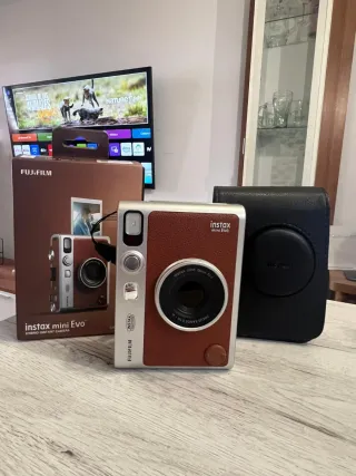 Cámara Fujifilm Instax Mini Evo Vendo o cambio
