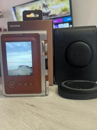 Cámara Fujifilm Instax Mini Evo Vendo o cambio