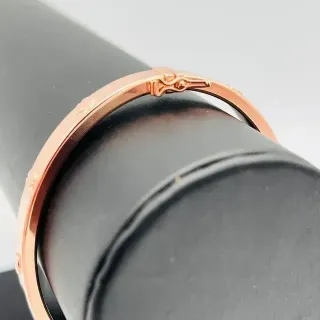 PULSERA RIGIDA TORNILLO ORO ROSA. Hueca. Oro 18k.