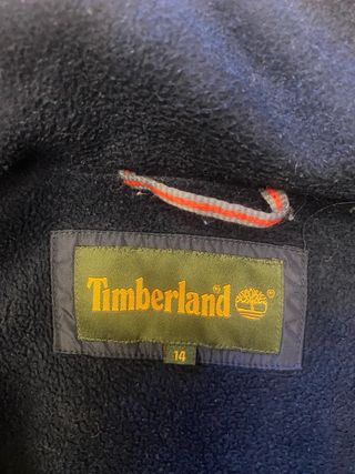 Parka impermeable niño beige.