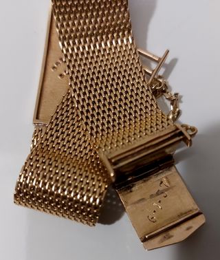 Pulsera Omega oro 18kt + 18 brillantes, peso 46gr