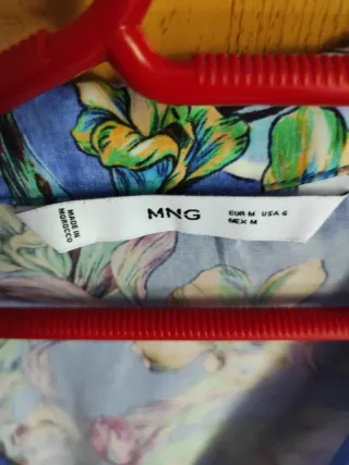 Camisa abierta floral sin mangas