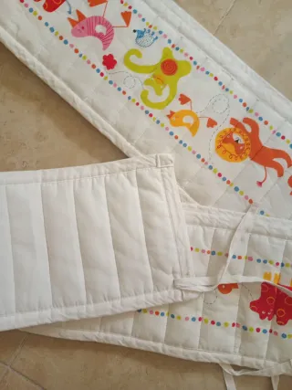 Protector chichonera cuna elefantes