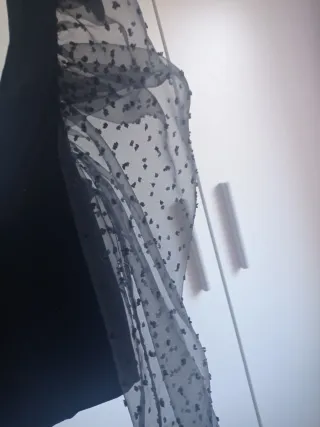 Top negro mangas abullonadas