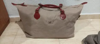 Macuto de viaje beige y rojo