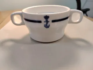 Taza de café con dos asas
