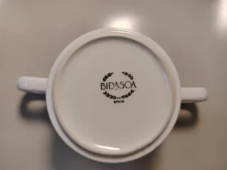 Taza de café con dos asas
