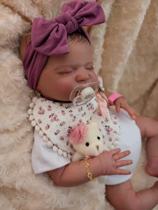 Reborn realizada con genesis horneada y barnizada