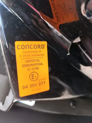 Silla de coche para bebé color rosa y gris