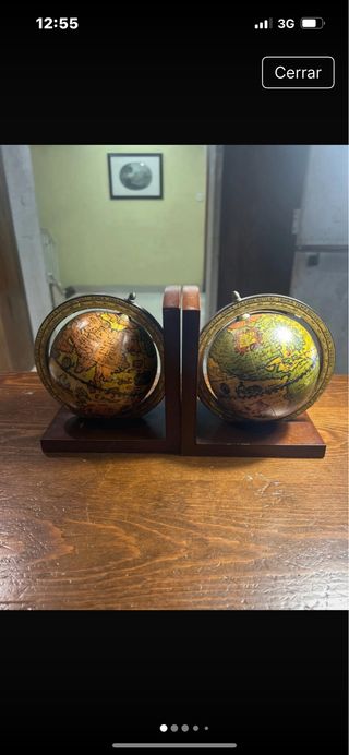 Antiguos sujetalibros de globos terráqueos
