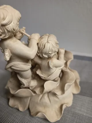 Decoración antigüedad querubín música