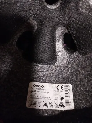 Patines rosas y morados con protecciones completas