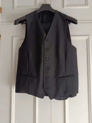 Traje de chaqueta y chaleco negro