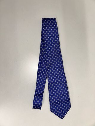 Cravatta vintage blu con fantasia bianca