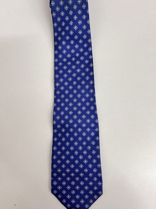 Cravatta vintage blu con fantasia bianca