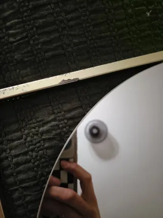 Espejo de pared dorado