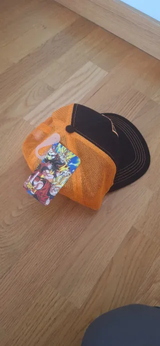 Gorra Pokemon Trucker Dragon Ball Z Negra y Naranj