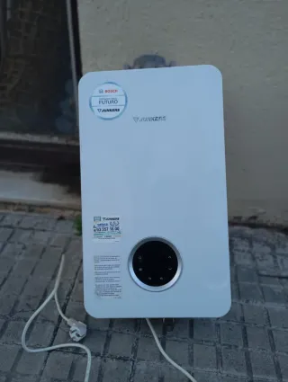 Calentador Junkers y Caldera Bax