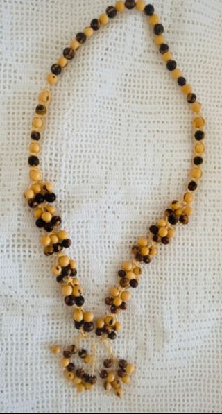 Collana lunga etnica in legno beige e marrone