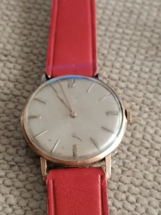 Reloj CAUNY PRYMA Vintage dorado y Rojo