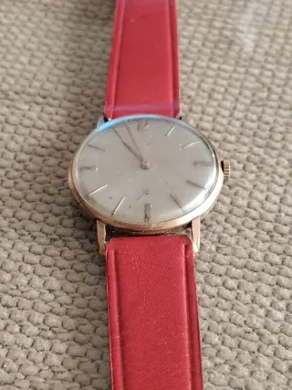 Reloj CAUNY PRYMA Vintage dorado y Rojo