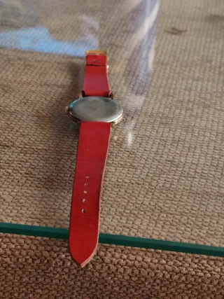 Reloj CAUNY PRYMA Vintage dorado y Rojo