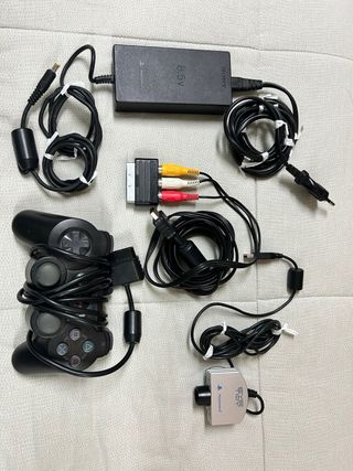 Sony PlayStation 2 PS2 Nera + accessori e 4 giochi