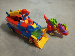 Juguetes: Camión de rescate y dinosaurio