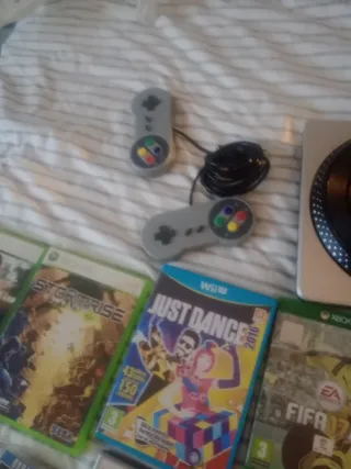 Varietà di console e videogiochi per PS2, PS4, Xbox, Wii e più