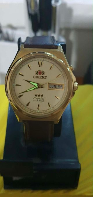 Reloj Orient Dorado y Marrón