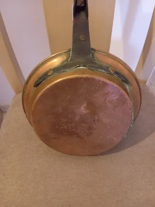 Antiguo calentador de cama de cobre