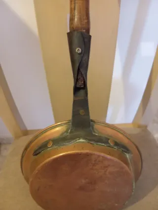 Antiguo calentador de cama de cobre