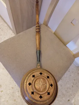 Antiguo calentador de cama de cobre