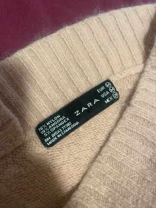 Suéter de angora rosa palido